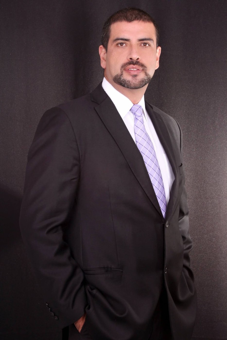 Retrato corporativo de Sergio Arenas